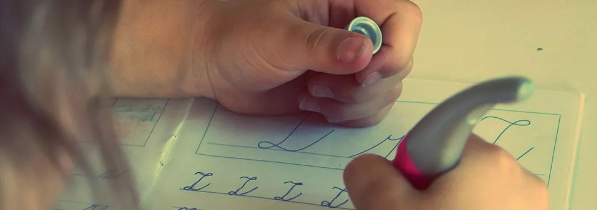 Child learns how to write